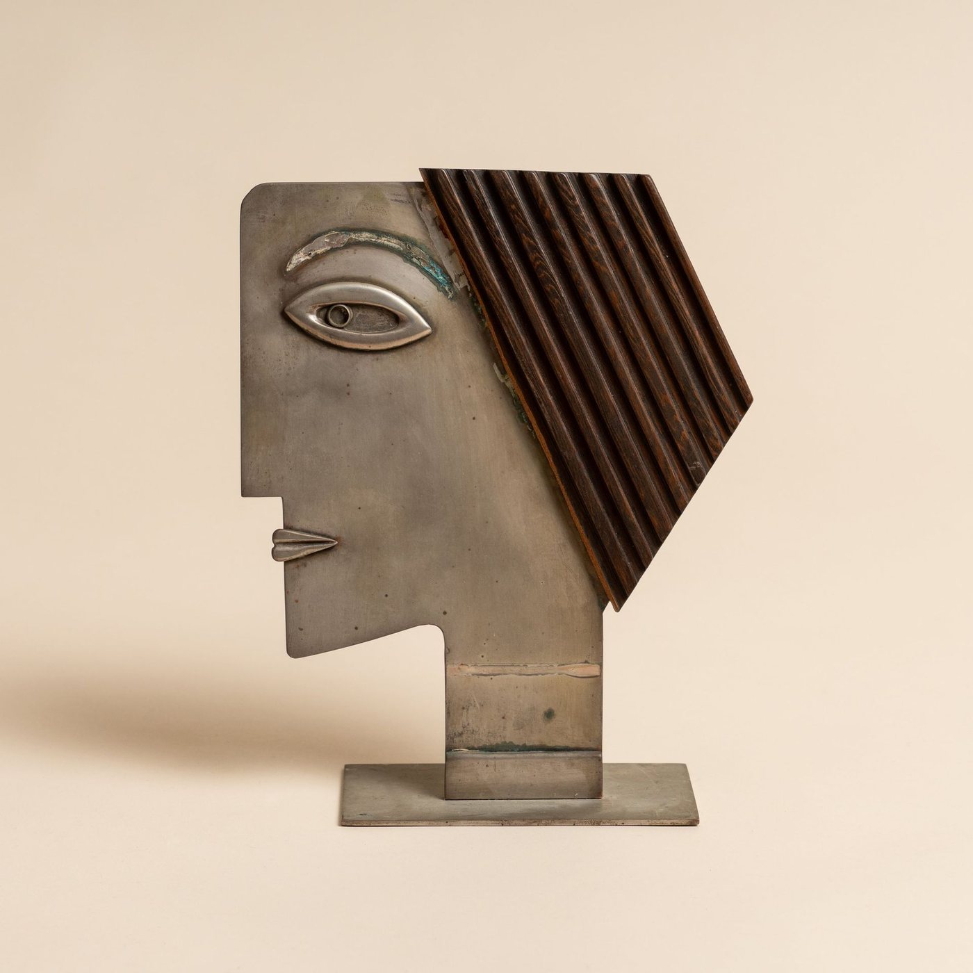 Cubist head in metal and wood